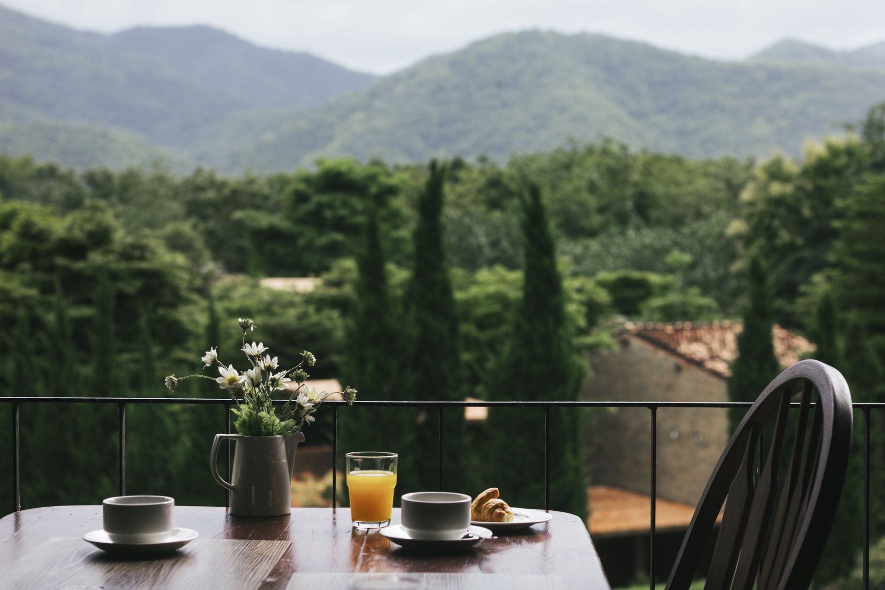Sunlit breakfast table with a view